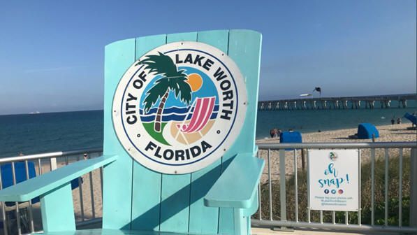 A blue chair with the city of lake worth florida on it